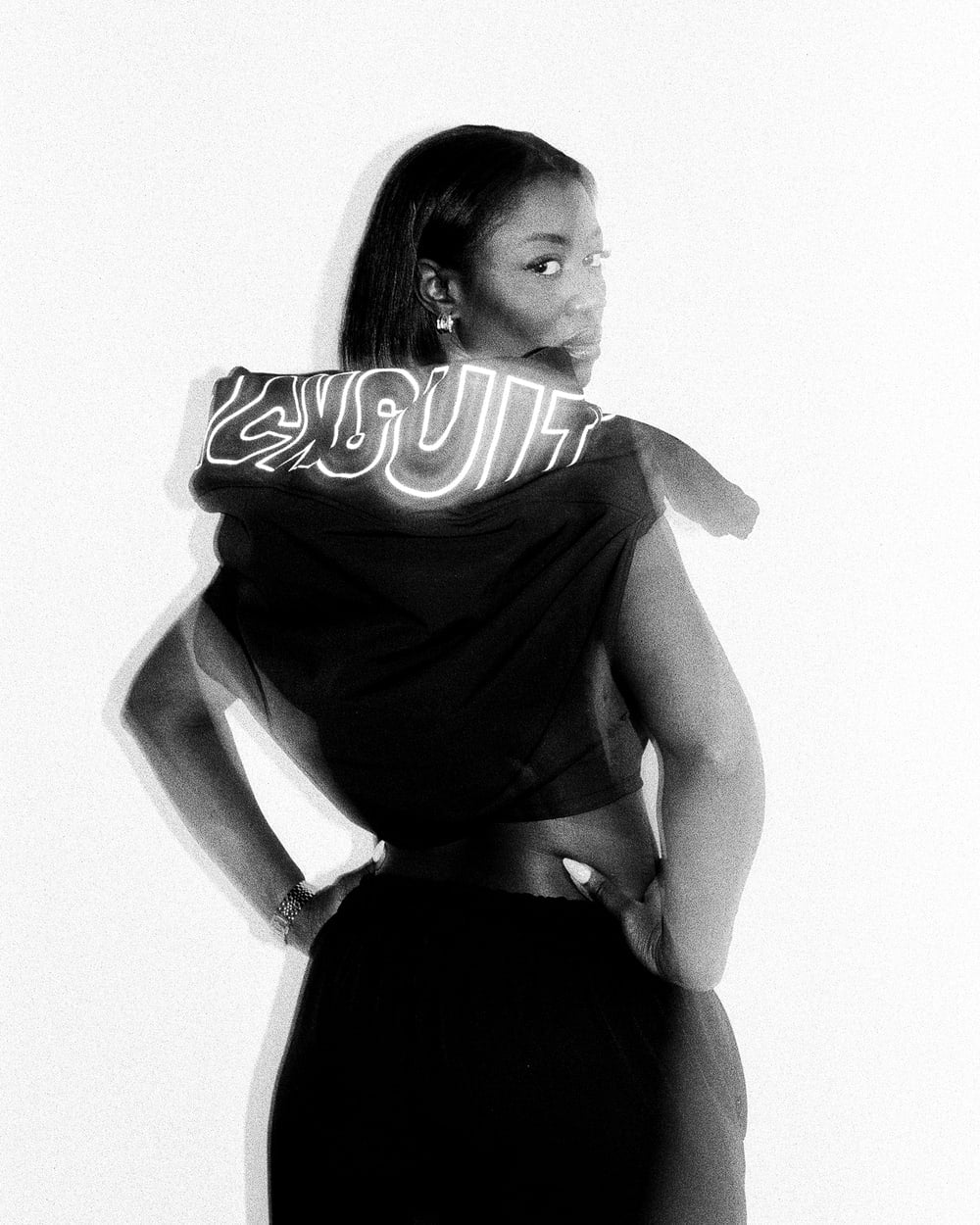 Harriet wearing the OG Trackjacket with reflective lettering